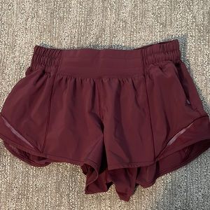Maroon lululemon size 4 shorts 2.5. Runs a little small but Perfect condition!